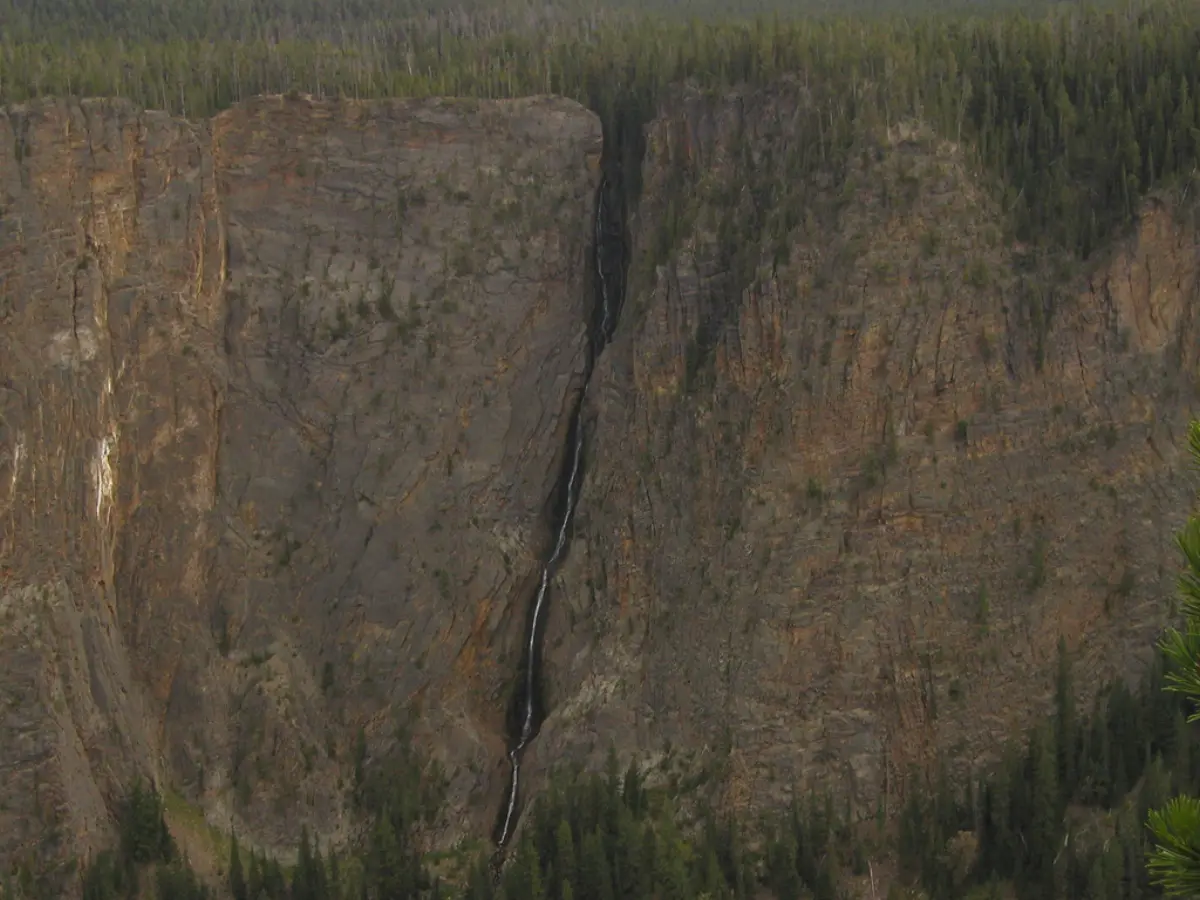 Silver Cord Cascade, a thin 1,214-foot horsetail waterfall dropping down the north wall of the Grand Canyon of the Yellowstone